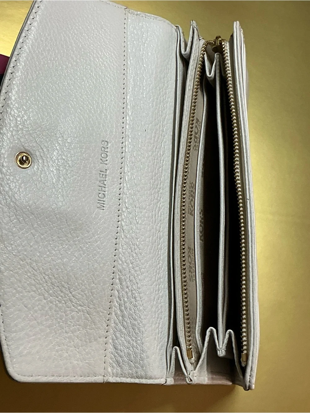 Michael Kors previously owned